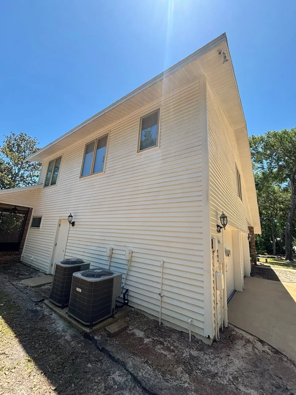 House exterior cleaned by Apply Pressure Washing